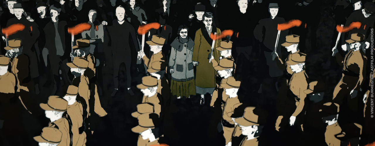 des personnes regardent un défilé militaire dans l'Allemagne nazie